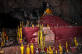 Luang Prabang, Laos - The Pak Ou Caves, the upper cave called Tam Theung. The caves, a Buddhist pilgrimage site, are a repository of old Buddha statues. 